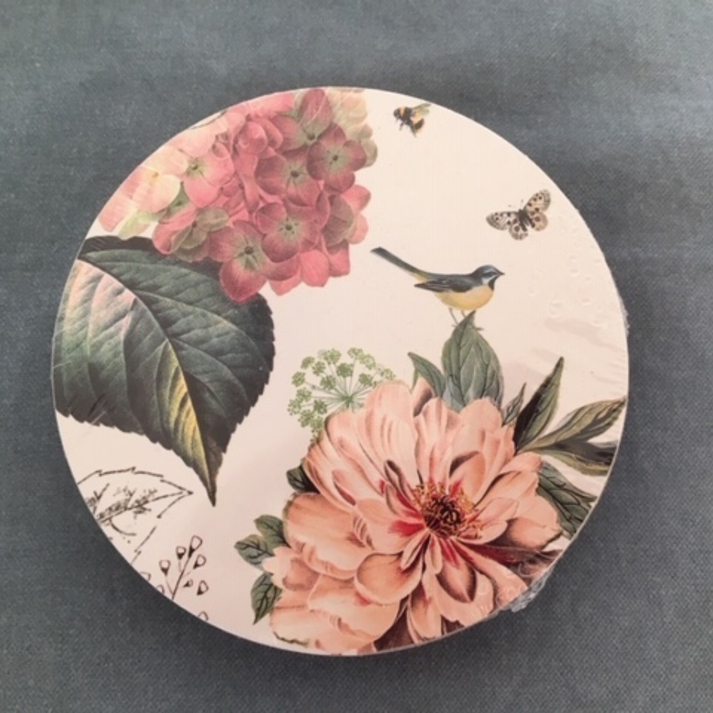 Four pretty vintage-style coasters